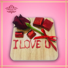 Small Wooden Tray With Fresh Flower And Chocolate
